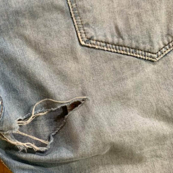 jeans levi's dechiré à réparer